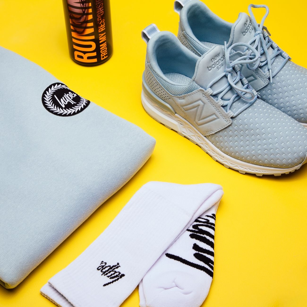 Colorful accessories flat lay on bright background